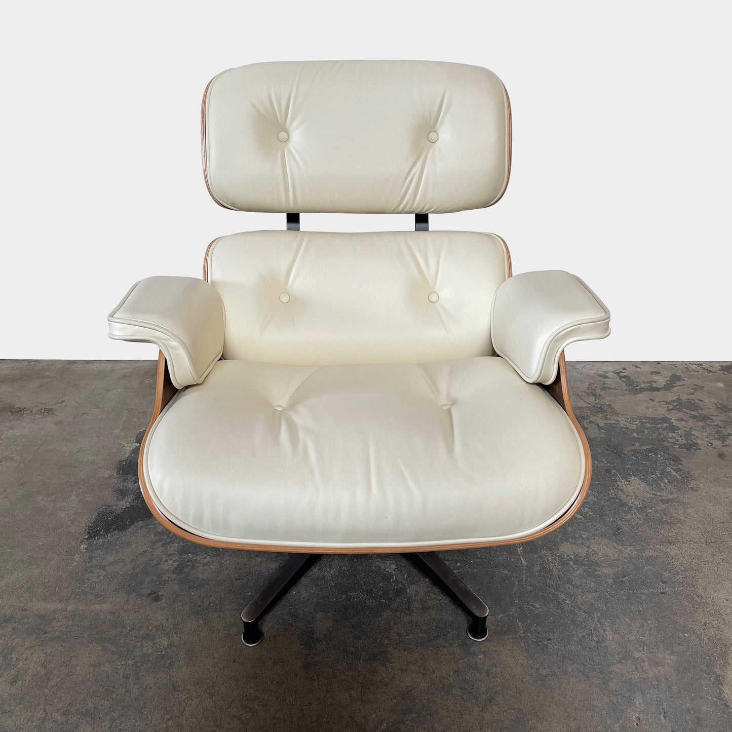 Fauteuil et ottoman Eames Lounge