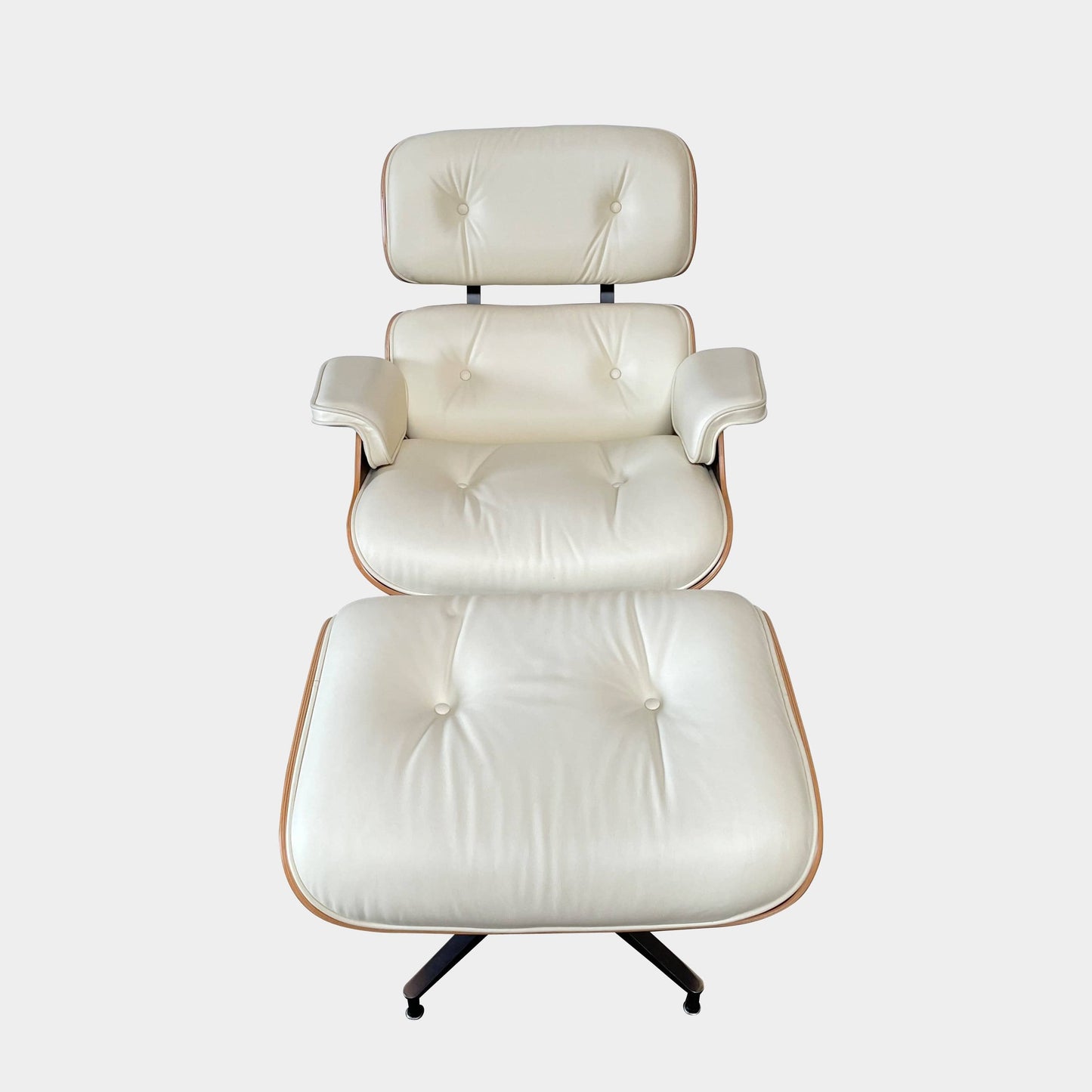 Fauteuil et ottoman Eames Lounge