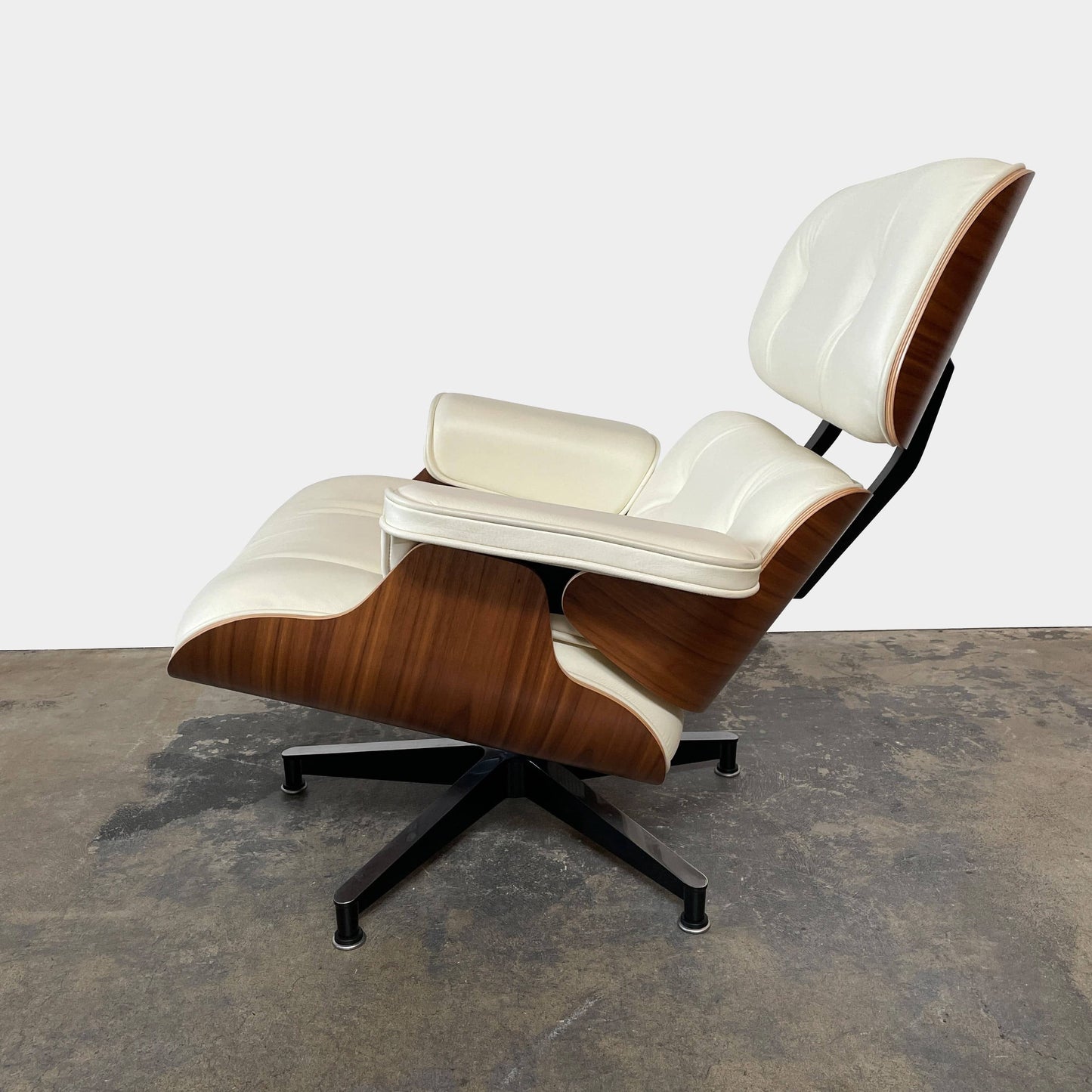Fauteuil et ottoman Eames Lounge