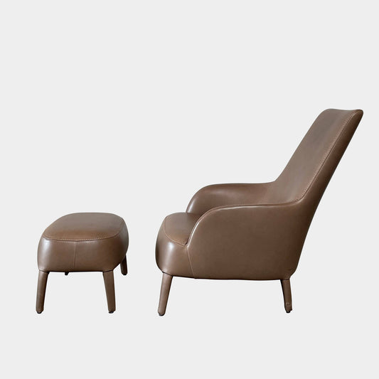 Fauteuil à dossier haut et pouf Maxalto Febo