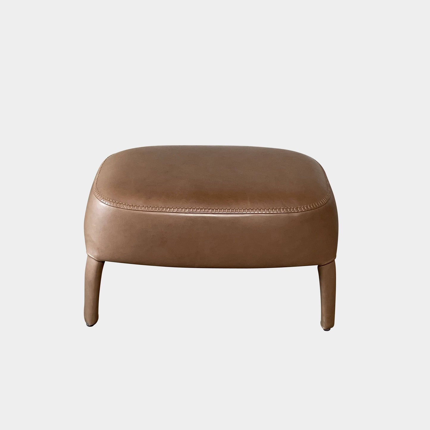 Fauteuil à dossier haut et pouf Maxalto Febo